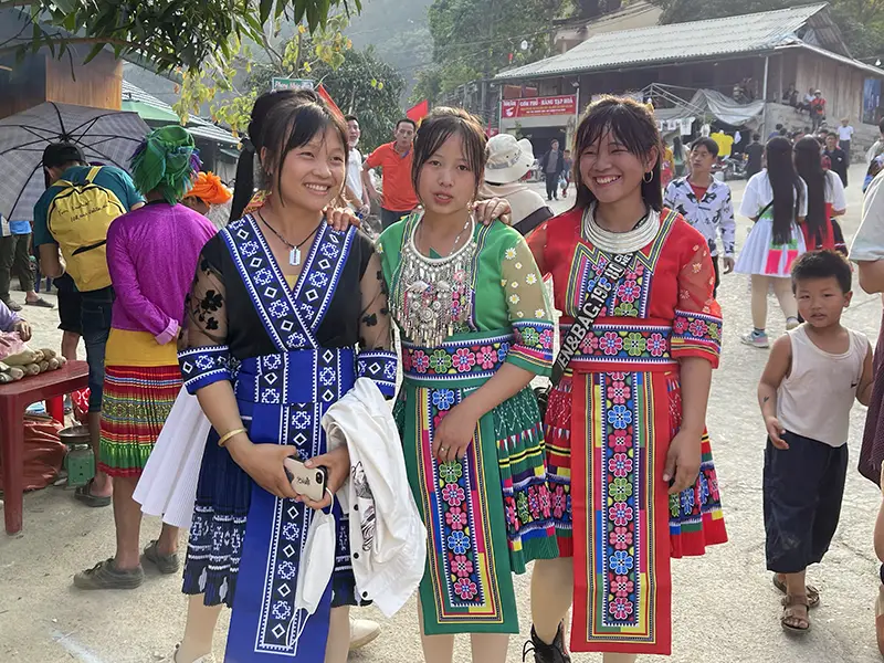 Vietnamese women from ethnic minority communities dressed in colorful handwoven garments