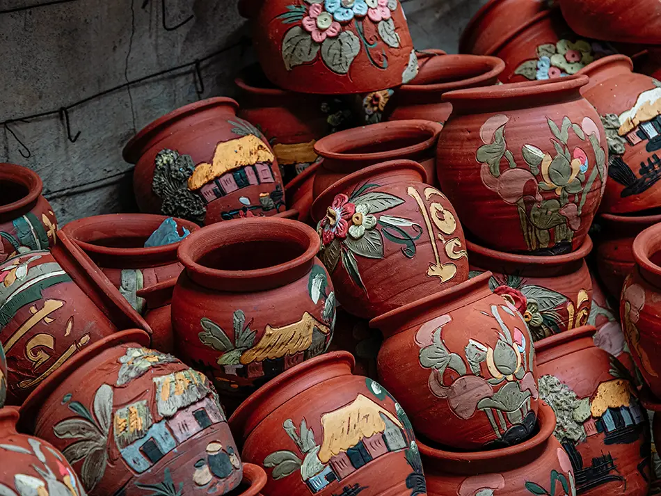 Handcrafted ceramic pots at But Trang market, a hidden gem showcasing Vietnamese artisan culture