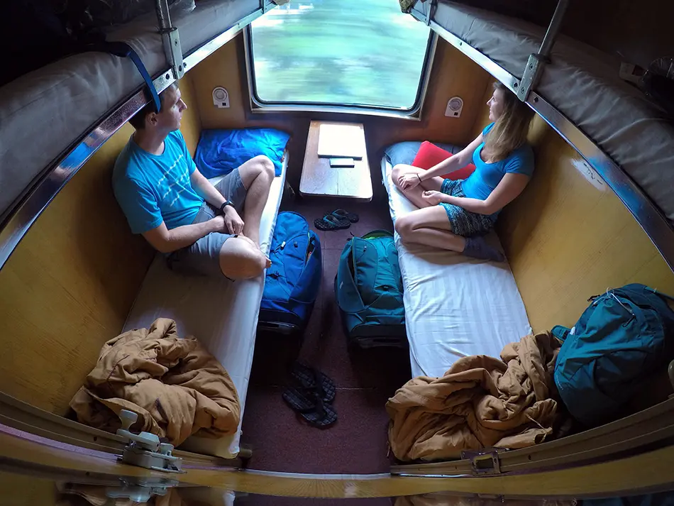 Soft sleeper cabin on Vietnam's Reunification Express, a popular long-distance train option for travelers.