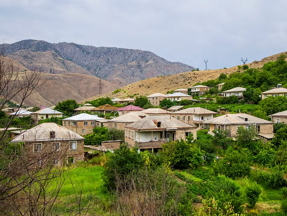 View of Areni village surrounded by vineyards and rocky hills, a popular wine region in Armenia