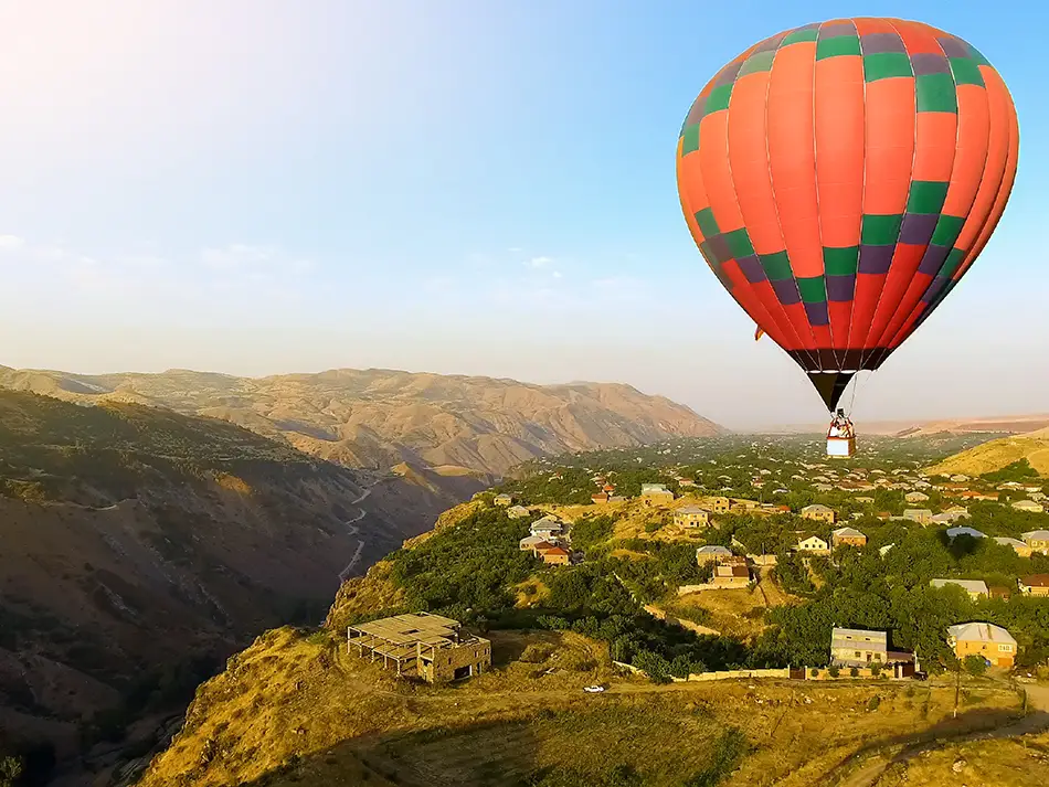 Hot air balloon flying over Garni gorge, one of the best things to do in Armenia