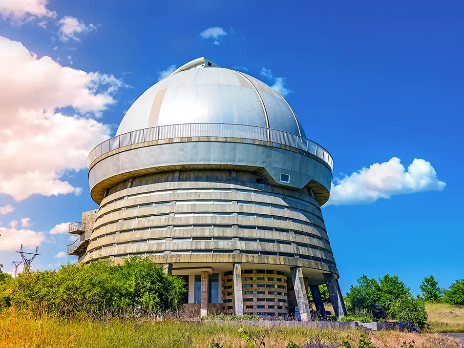 The Soviet-era Byurakan Astrophysical Observatory under a blue sky