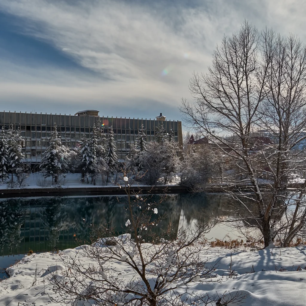 Snow-covered sanatorium and frozen lake in Jermuk, a peaceful Armenian spa retreat