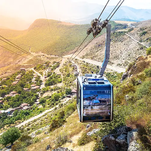 Wings of Tatev cable car gliding above Vorotan Gorge, a scenic adventure ride in Armenia