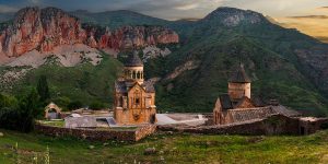 Noravank Monastery beneath crimson cliffs near Areni at sunset, one of the best things to do in Areni.