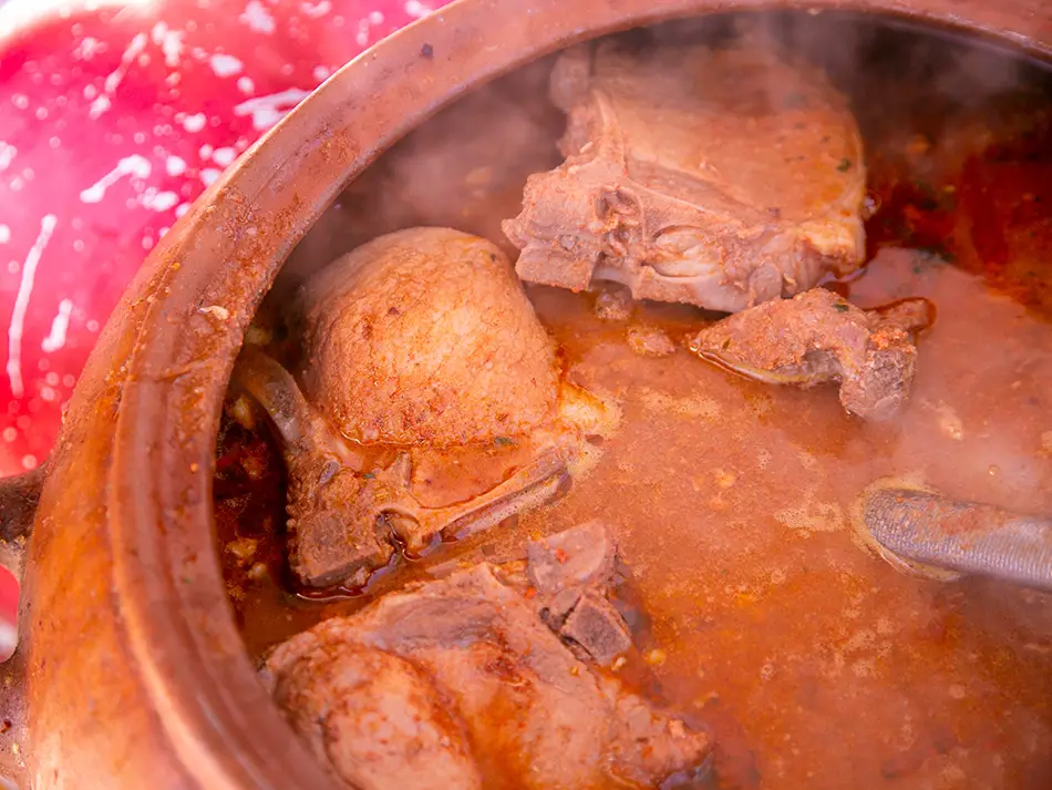 Local food in Peru: adobo arequipeño pork stew simmered with chicha de jora in Arequipa.