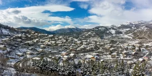 Snowy aerial of Dilijan in Armenia, highlighting the best things to do in Dilijan.