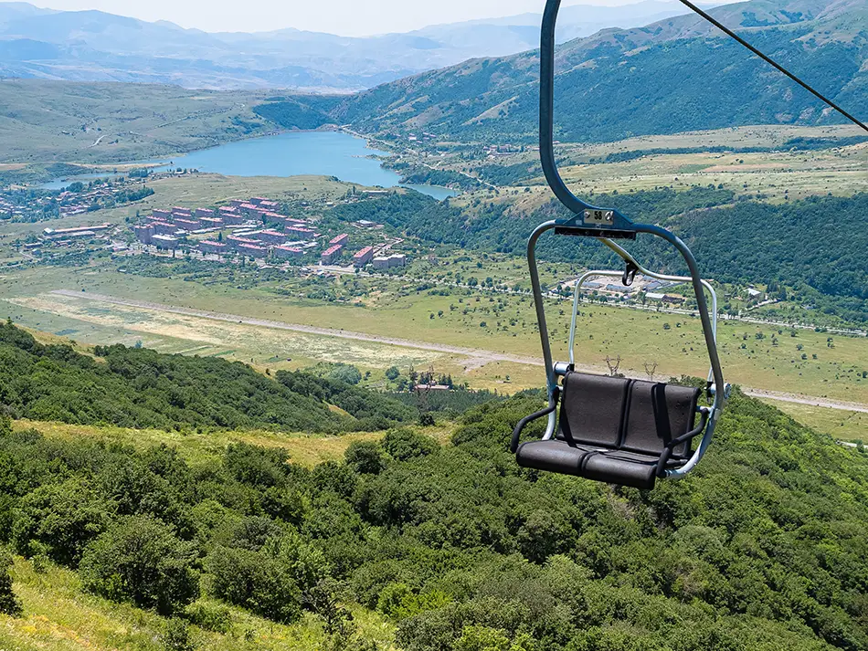 A chairlift over meadows near town.