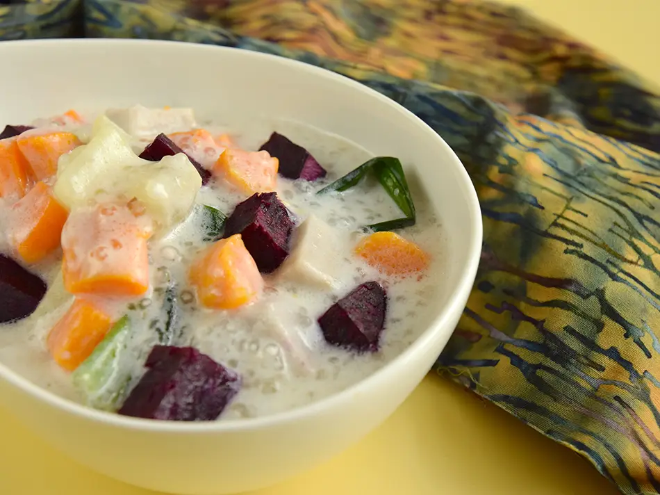 Bubur cha cha with sweet potato, taro and sago in coconut milk.