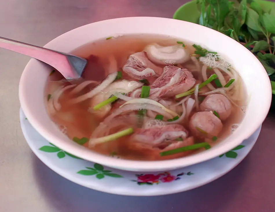 Kuy Teav, Cambodian noodle soup with pork, beef, or seafood, a traditional breakfast staple in Cambodia