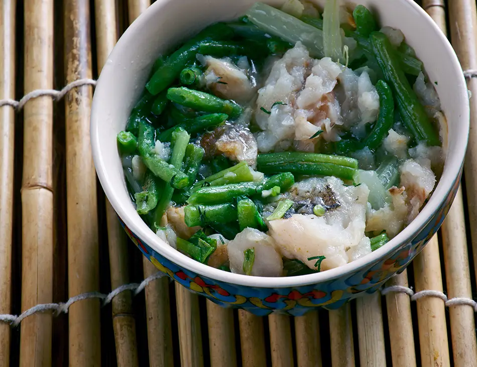 Samlor Kako, traditional Cambodian vegetable and rice soup, featuring prahok and roasted rice