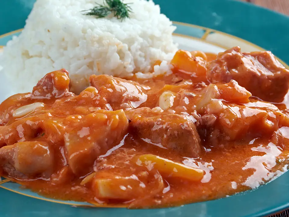 Traditional Peru dishes: carapulcra with papa seca, pork and peanuts from Chincha.