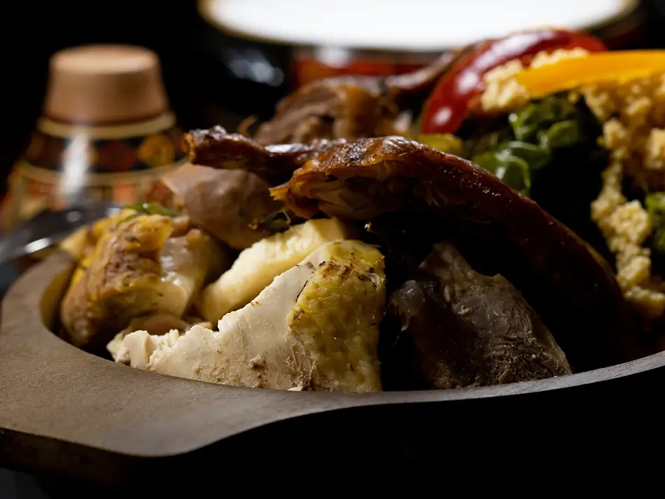 Chiriuchu festival platter from Cusco highlights national dishes of Peru with cuy, charqui and corn tortillas.
