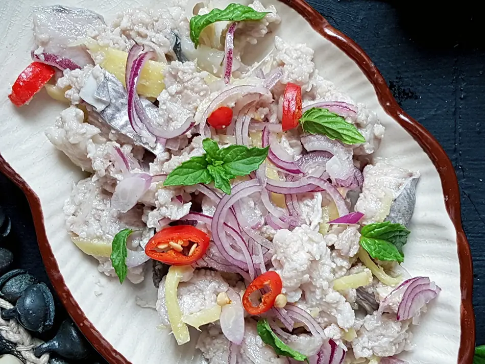 Fresh hinava with raw mackerel cured in lime juice, chili and ginger.