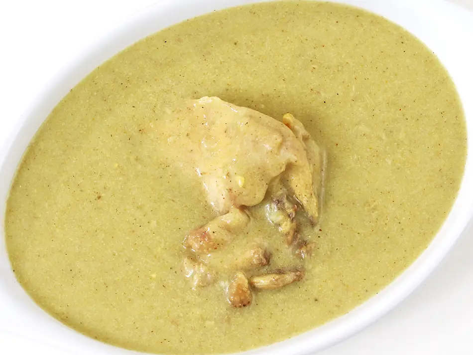 Inchicapi from Loreto, must-try foods in Peru, blends peanut broth with yuca and hen.