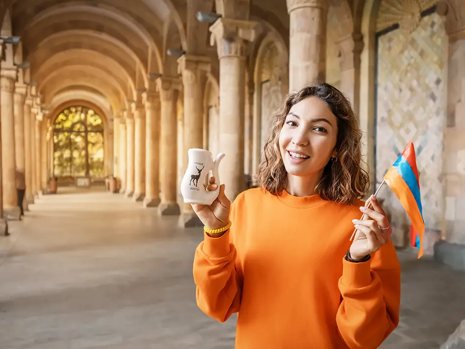 Cheerful traveler in historic arcade