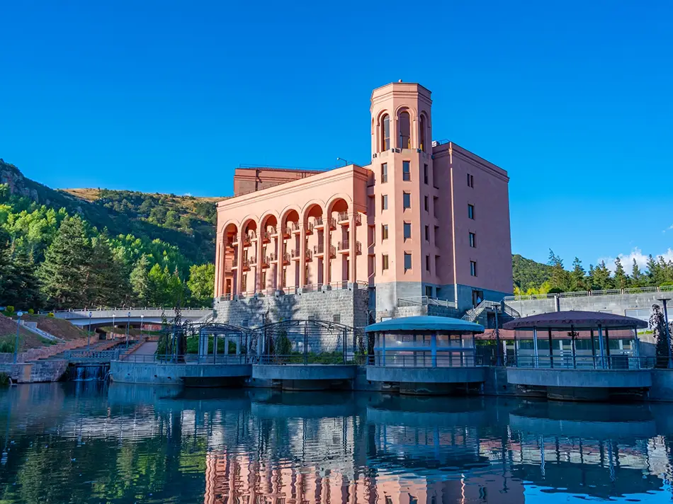 Grand lakeside sanatorium in Jermuk at dusk, a highlight of best things to do in Jermuk.
