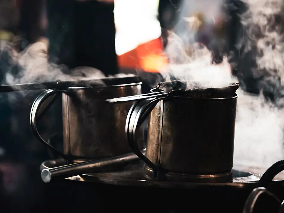 Strong Kafae Lao brewed through a cloth filter, sweetened with condensed milk — local beverages in Laos.