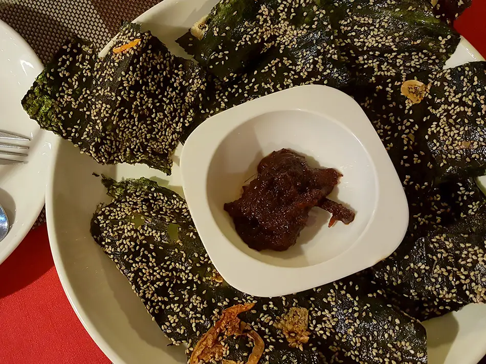 Iconic foods of Laos: kaipen river-weed crisps with sesame and garlic from Luang Prabang.