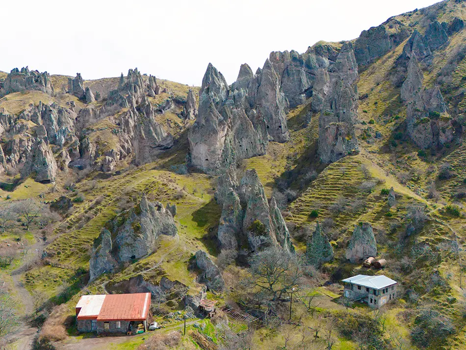 Eroded rock spires and caves.