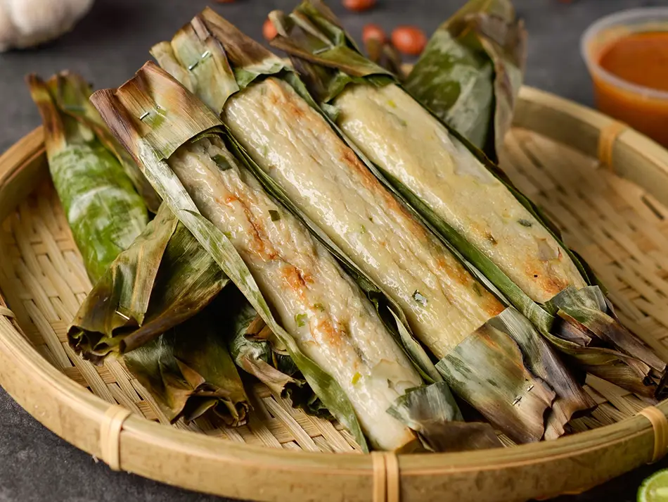 Otak-otak fish cake grilled in banana leaf until fragrant, a typical Malaysian snack.