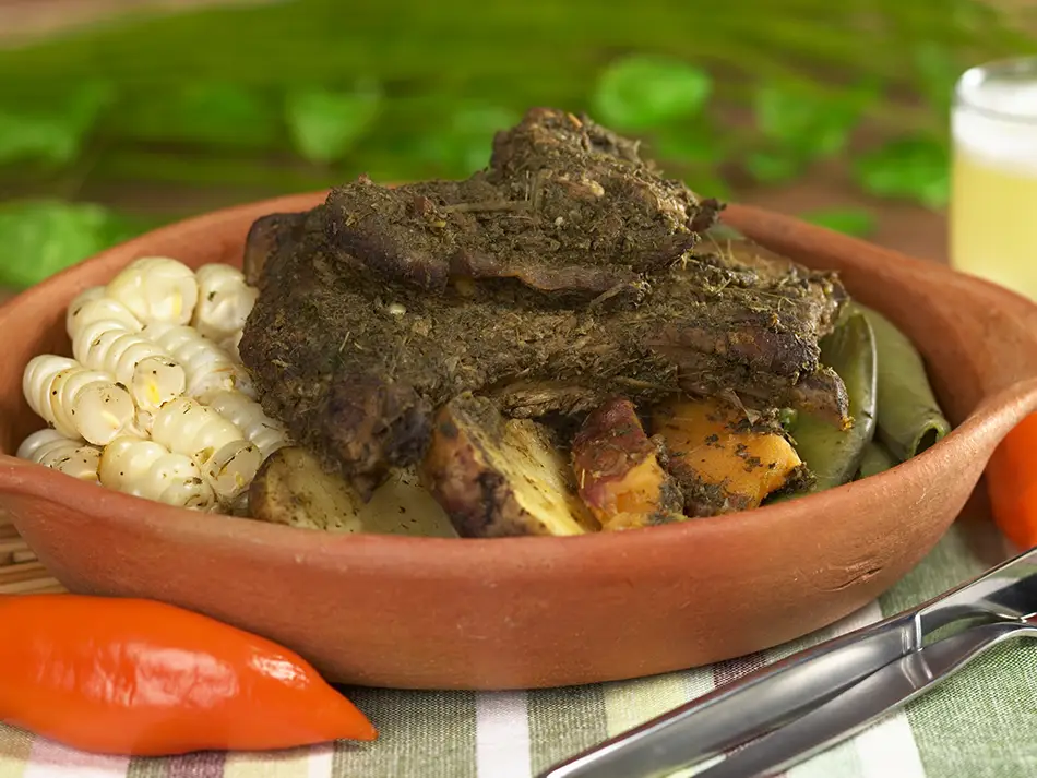 In the best food in Peru, pachamanca meats and tubers cook under hot stones in Huancayo.