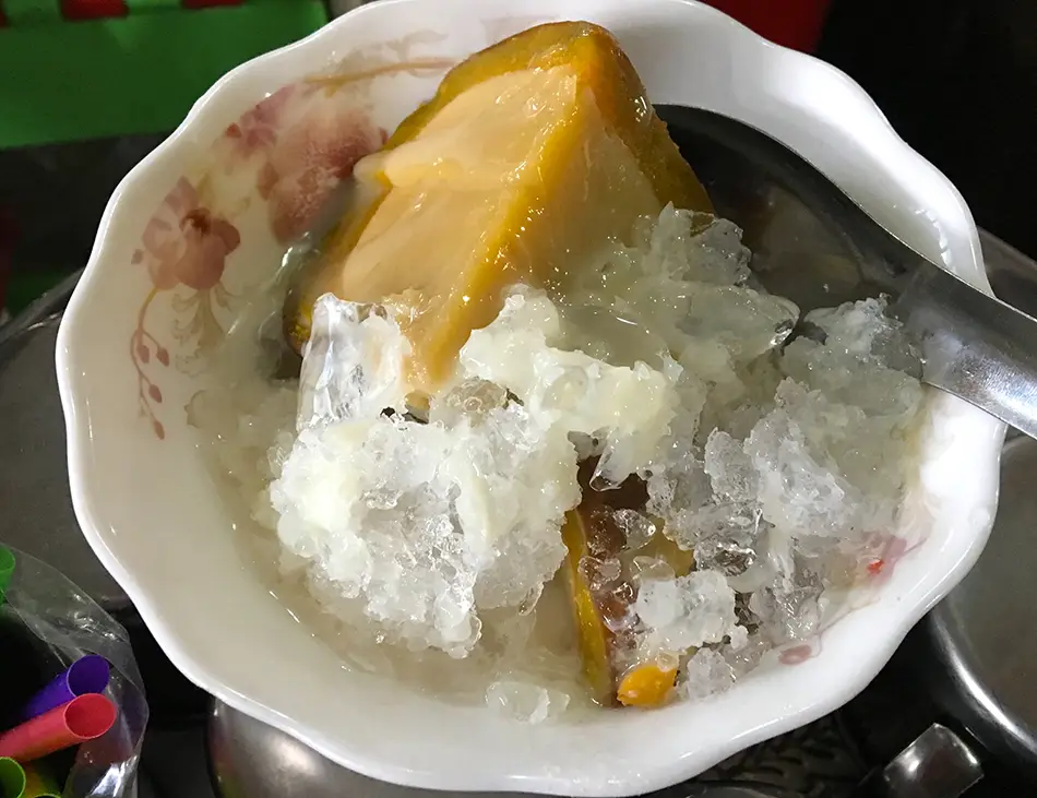 Sankhya Lapov, steamed pumpkin custard, a traditional Cambodian dessert among the best food in Cambodia