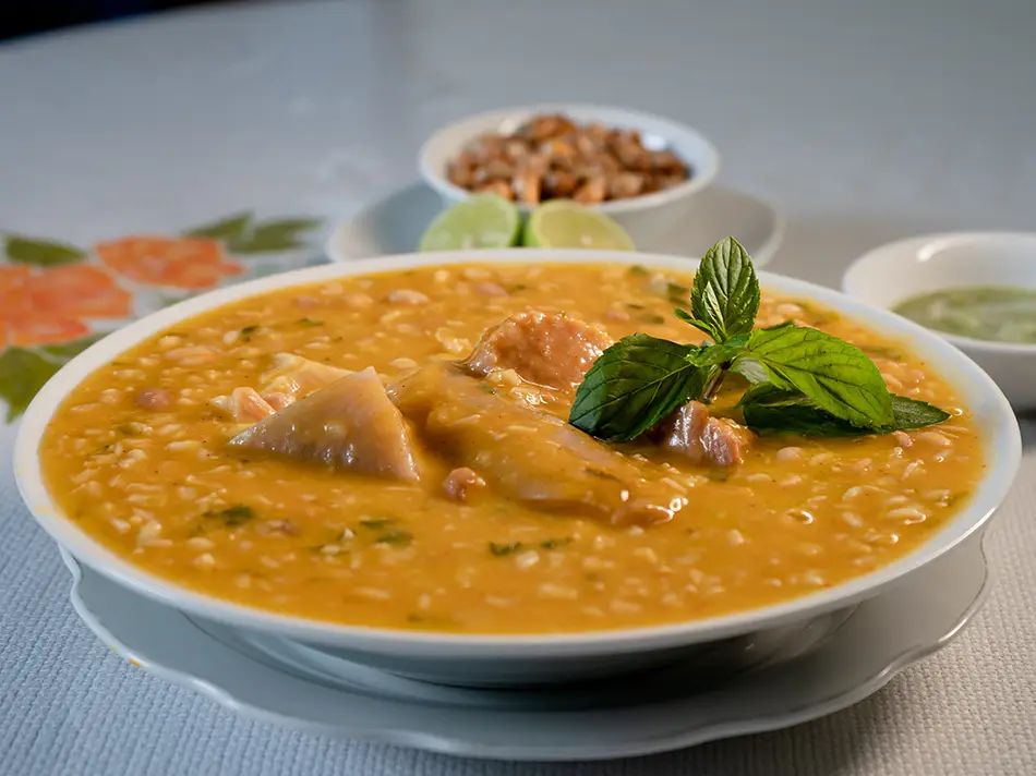 Famous Peru foods: shambar Monday soup from Trujillo with wheat, beans and smoked pork.