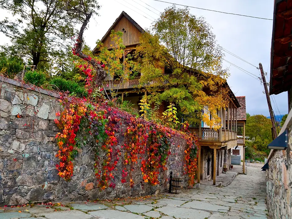 Ivy-covered house along a quiet stone lane in Old Dilijan, Armenia.