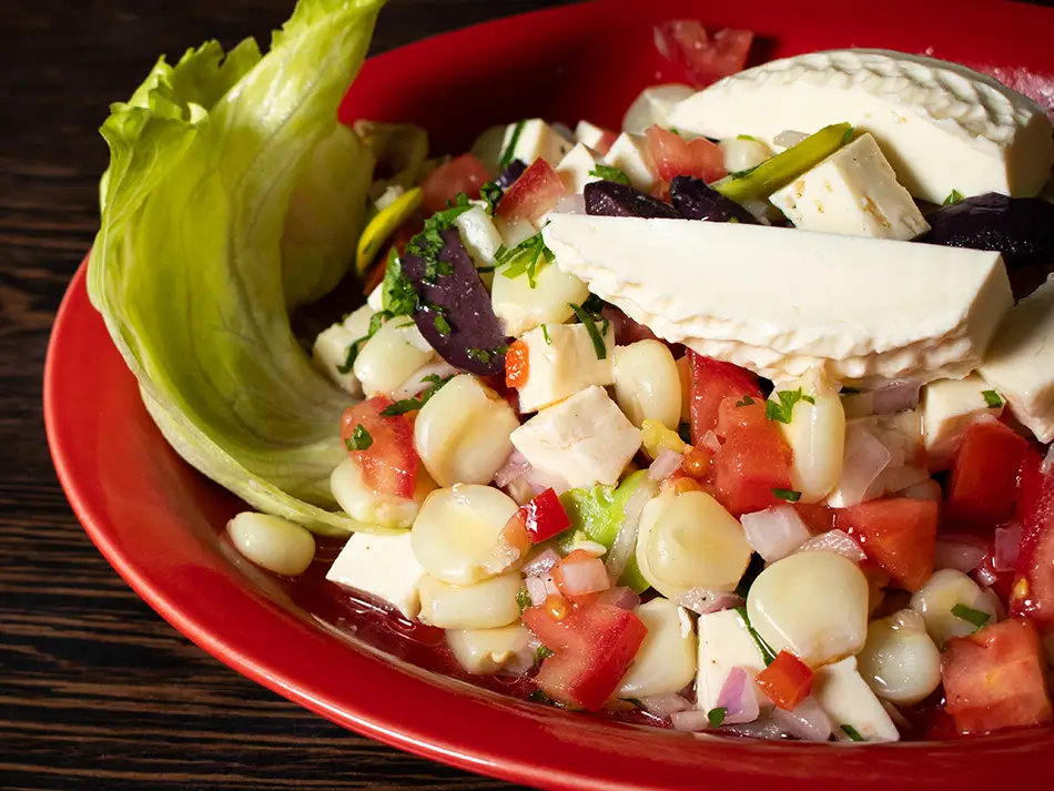 Solterito salad of queso fresco, fava beans and corn from Arequipa, brightly chopped and dressed.