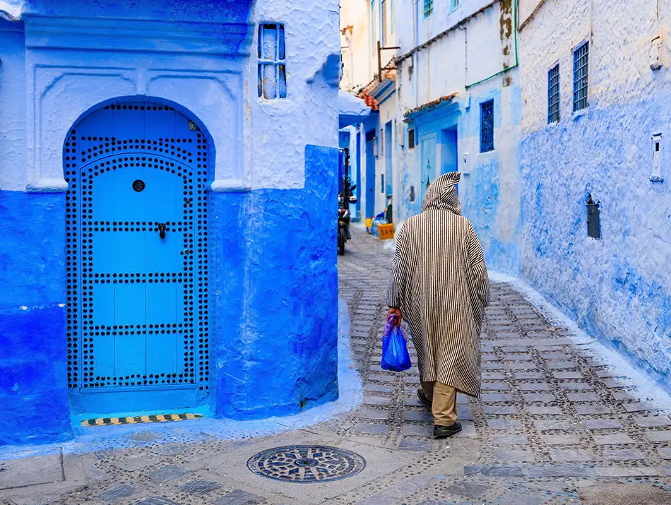 Blue-painted alley in the medina showcasing one of the best things to do in Chefchaouen.