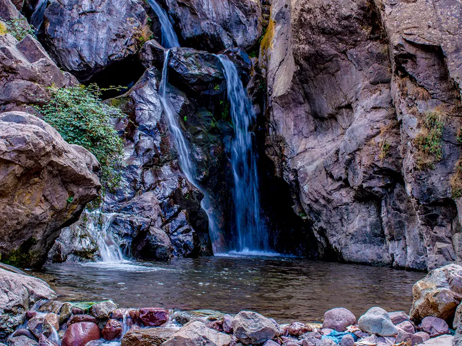 Small waterfall and rock pool at the Imlil cascades in the High Atlas.