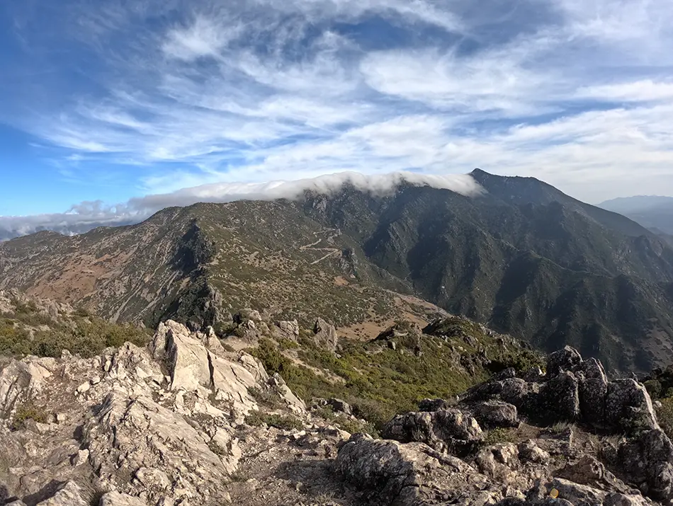 Panoramic summit views from Jebel El-Kelaa above Chefchaouen’s rugged mountains.