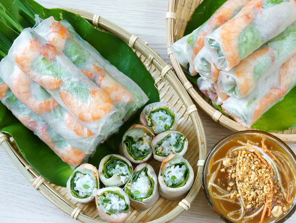 Fresh spring rolls with pork, shrimp and herbs served with peanut sauce.