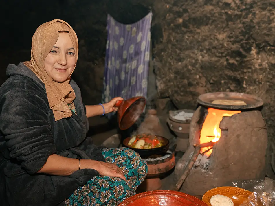 Berber woman cooks local food in Imlil.