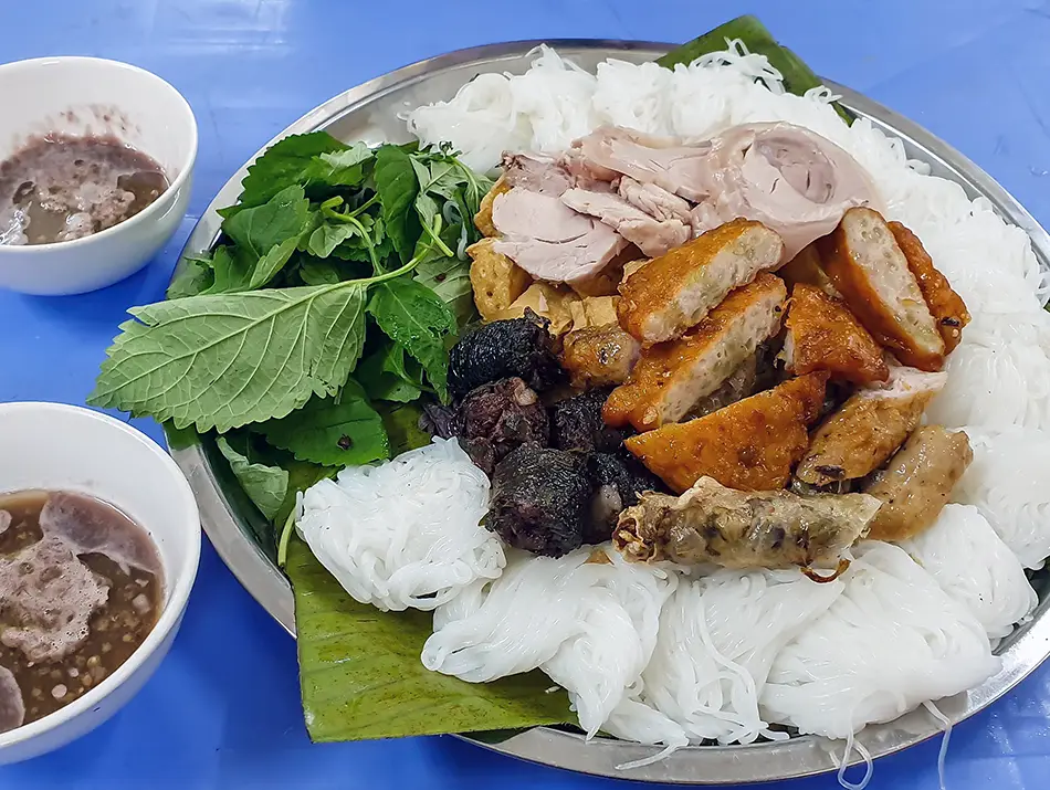 Bun Dau Mam Tom platter with tofu, herbs, noodles, and shrimp paste sauce. Famous local food in vietnam