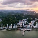 Aerial view of town and bay, highlighting the best things to do in Cat Ba Island