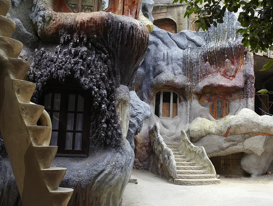 Fantasy-style architecture at Hang Nga Guesthouse, also known as the Crazy House, with tree-shaped walls.