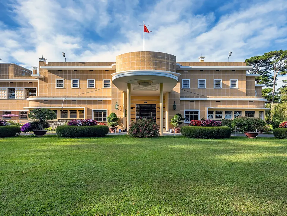 Yellow colonial-style villa of Bao Dai Summer Palace, a must-see historical stop in Dalat.