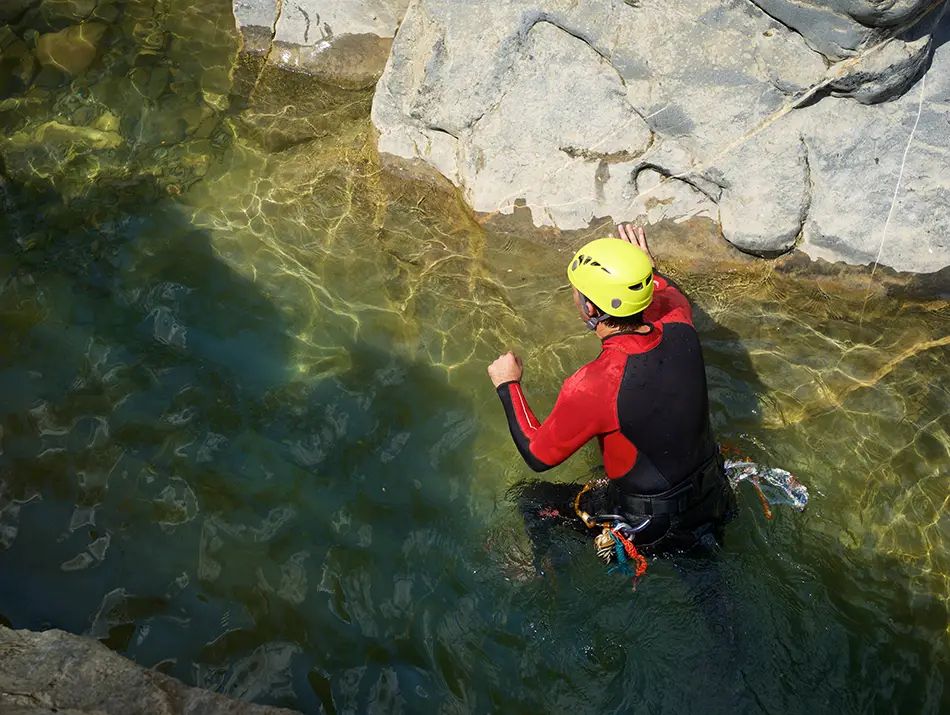 A man canyoning at Datanla Waterfall
