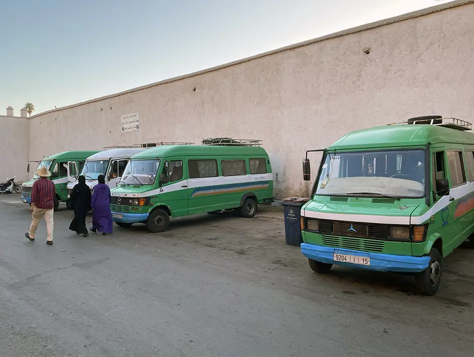 Minibus stand in Marrakesh showing how to get to Marrakesh