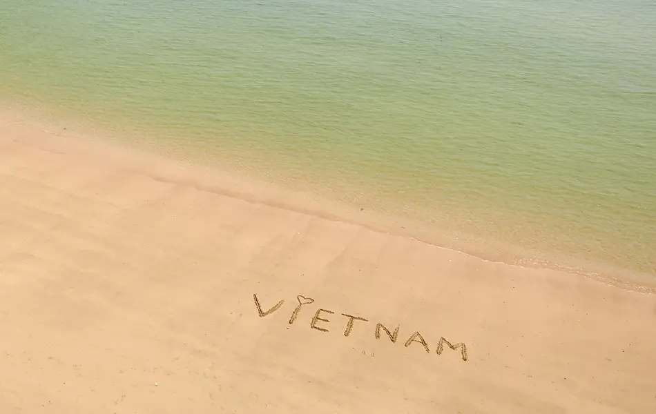Golden sand and calm turquoise water at Tung Thu Beach