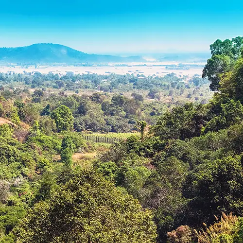 Lush forested hills of Kep National Park, a hidden gem in Cambodia for hiking and views.