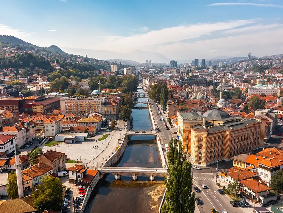 City spreading across a wide valley framed by surrounding hills in one of the best countries to visit in 2026.