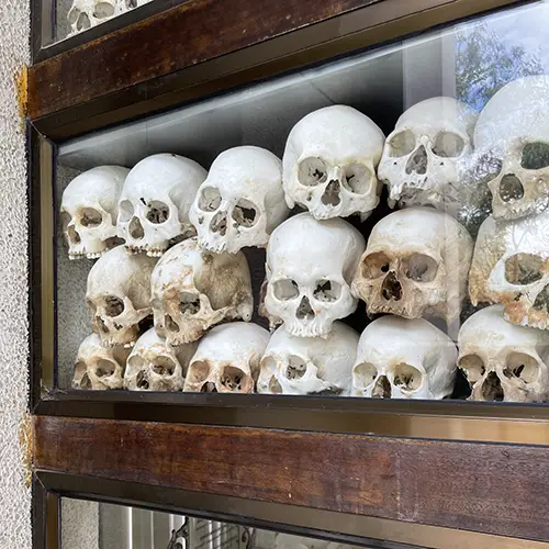 Shelved human skulls inside Choeung Ek memorial stupa in Phnom Penh.