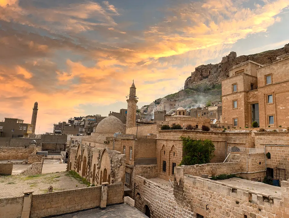 Stone terraces and minarets on a hillside