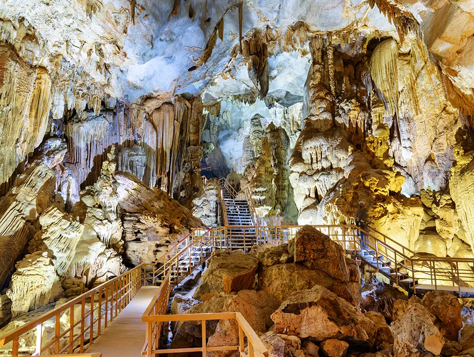 Sweeping limestone formations fill Tien Son Cave, often mentioned in the Phong Nha travel guides.