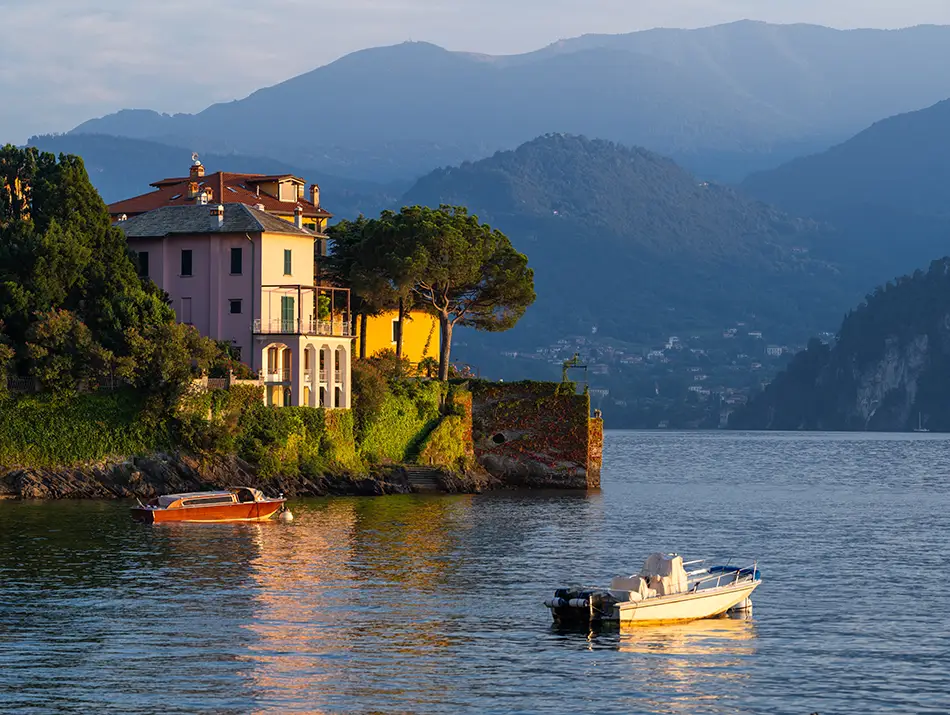 illa and small boats along the shore of Lake Como, a serene dream travel destination for 2026.