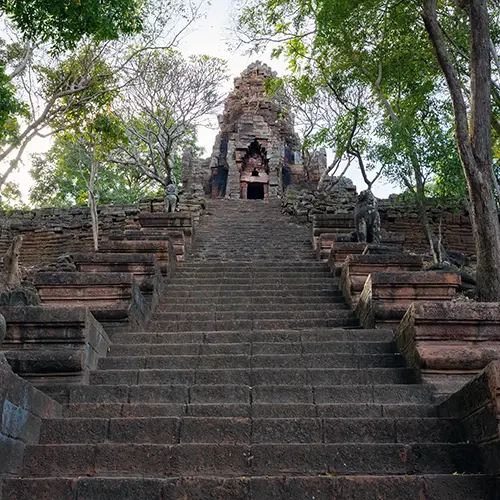 Steep laterite steps climb to Banan Temple’s hilltop shrine