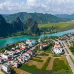 Aerial panorama of Phong Nha showing scenic rivers and peaks featured among the Best Things to Do in Phong Nha.